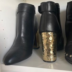 Gold heeled black boots